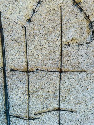 AN ASSORTMENT OF BARBED WIRE