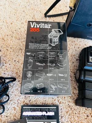 VTG ACCURA DELUXE TRIPOD AND SEVERAL VIVTAR AND OTHER CAMERA EXTRAS