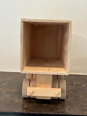 HAND CRAFTED WOODEN TOYS WITH AN EMBEDDED PENNY FOR THE YEAR THEY WERE MADE