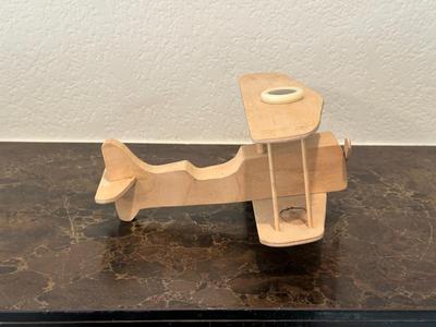 HAND CRAFTED WOODEN TOYS WITH AN EMBEDDED PENNY FOR THE YEAR THEY WERE MADE