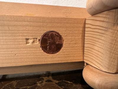 HAND CRAFTED WOODEN TOYS WITH AN EMBEDDED PENNY FOR THE YEAR THEY WERE MADE