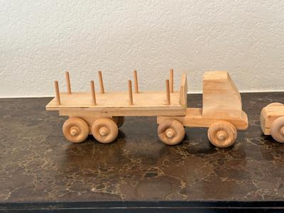 HAND CRAFTED WOODEN TOYS WITH AN EMBEDDED PENNY FOR THE YEAR THEY WERE MADE