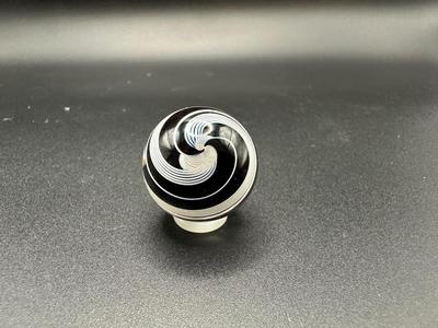 WHITE LATTICINIO SWIRL CORE MARBLE WITH BLACK AND WHITE SWIRLS