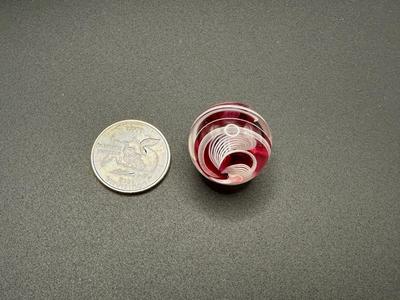 RED AND WHITE LATTICINIO SWIRL CORE MARBLE