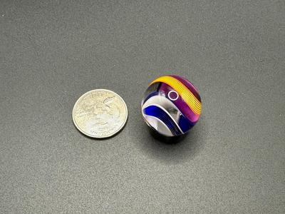 VIBRANT MULTICOLORED RIBBON CORE SWIRL MARBLE