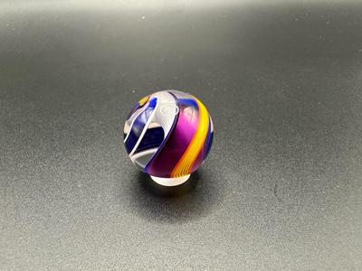VIBRANT MULTICOLORED RIBBON CORE SWIRL MARBLE