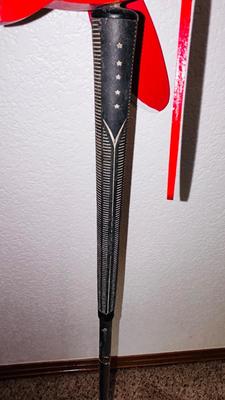 THE CARDINAL STAKED YARD ART AND A WOODEN BEAVER