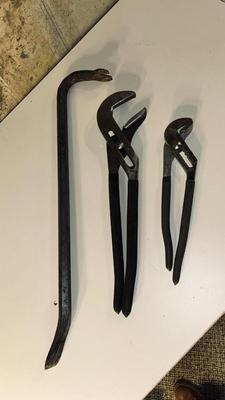CROWBAR AND A SET OF CHANNEL LOCK PLIERS