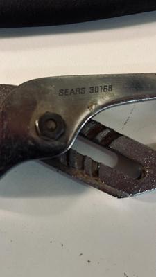 CROWBAR AND A SET OF CHANNEL LOCK PLIERS