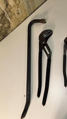 CROWBAR AND A SET OF CHANNEL LOCK PLIERS
