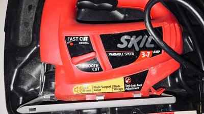 ELECTRIC SKIL JIGSAW AND HEAVY ORANGE EXTENSION CORD