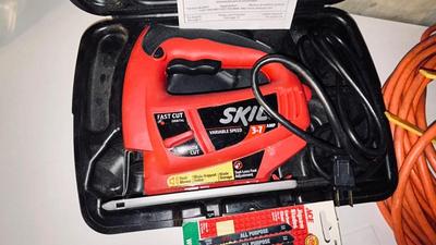 ELECTRIC SKIL JIGSAW AND HEAVY ORANGE EXTENSION CORD