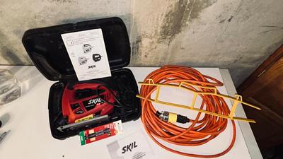 ELECTRIC SKIL JIGSAW AND HEAVY ORANGE EXTENSION CORD