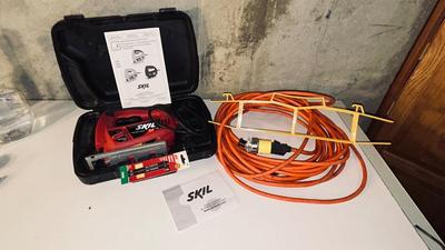 ELECTRIC SKIL JIGSAW AND HEAVY ORANGE EXTENSION CORD