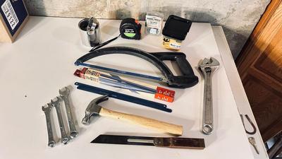 A VARIETY OF HAND TOOLS