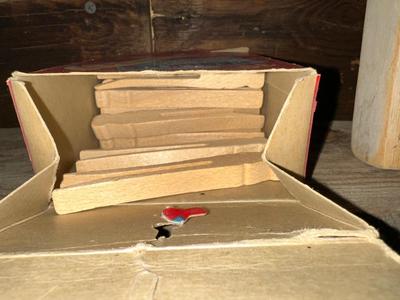 BROWN BRASS WASHBOARD, OLD CLOTHESPINS AND CLOTHES IRON