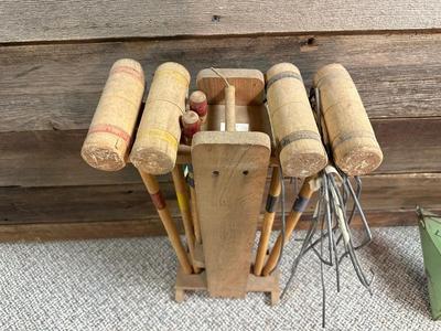 OLD CROQUET SET AND WOODEN STAKED YARD ART HOSE HOLDER