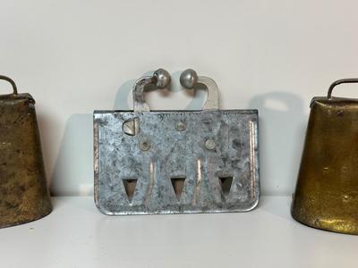 VINTAGE METAL CALF WEANER AND 2 COW BELLS