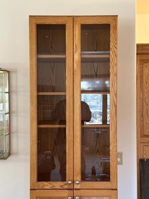 TALL NARROW OAK DISPLAY CABINET WITH CABINET