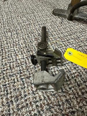 FORD MOTOR CO AIR PUMP AND WRENCH PLUS AN OLD TUBE STRAPPER