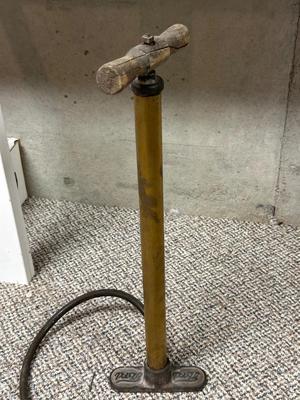 FORD MOTOR CO AIR PUMP AND WRENCH PLUS AN OLD TUBE STRAPPER