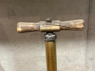 FORD MOTOR CO AIR PUMP AND WRENCH PLUS AN OLD TUBE STRAPPER