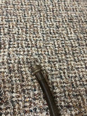 FORD MOTOR CO AIR PUMP AND WRENCH PLUS AN OLD TUBE STRAPPER