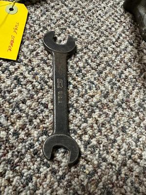 FORD MOTOR CO AIR PUMP AND WRENCH PLUS AN OLD TUBE STRAPPER