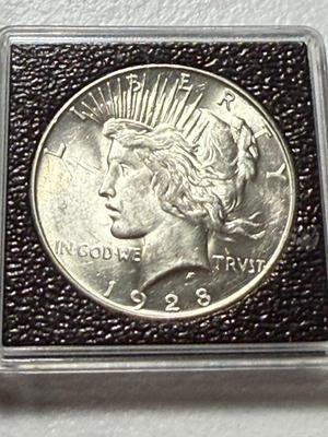 1928-S CHOICE AU CONDITION PEACE SILVER DOLLAR AS PICTURED.