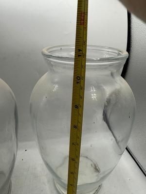 2 large clear vases