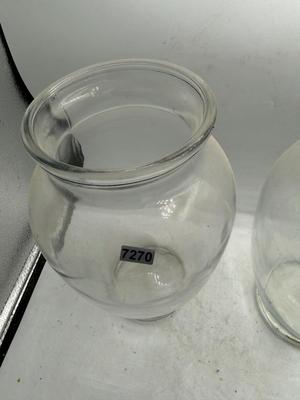 2 large clear vases