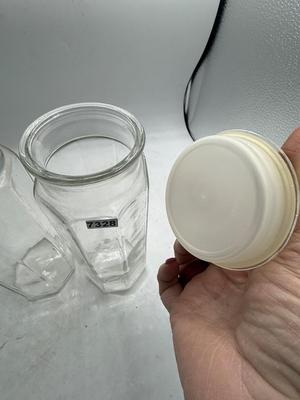 2 clear glass storage containers