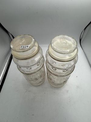2 clear glass storage containers