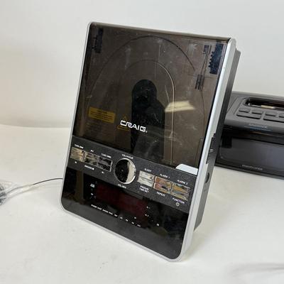 LOT 52: Craig CD Shelf System w/ Dual Alarm Clock AM/FM Stereo Radio Model CM427, Memorex iPhone/iPod Clock Radio Model Mi4290PBLK &...