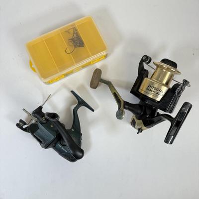 LOT 62: Pair of Fishing Reels: Integra Black Gold Series II 4500 & Green Sport Fisher