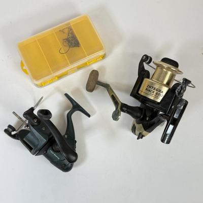 LOT 62: Pair of Fishing Reels: Integra Black Gold Series II 4500 & Green Sport Fisher