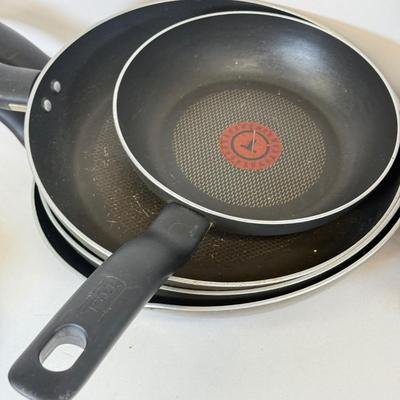 LOT 76: Hanging Metal Pot Rack w/ Farberware Pots & T-Fal Pans