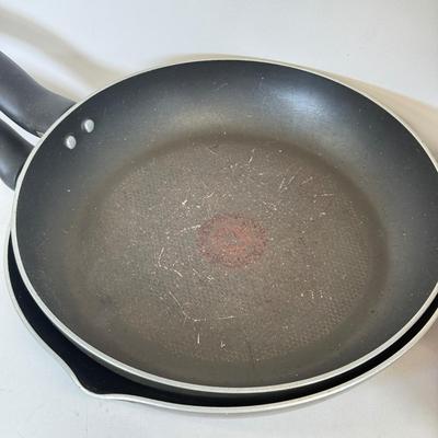 LOT 76: Hanging Metal Pot Rack w/ Farberware Pots & T-Fal Pans