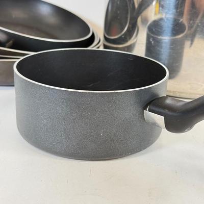 LOT 76: Hanging Metal Pot Rack w/ Farberware Pots & T-Fal Pans