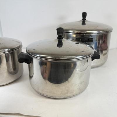 LOT 76: Hanging Metal Pot Rack w/ Farberware Pots & T-Fal Pans