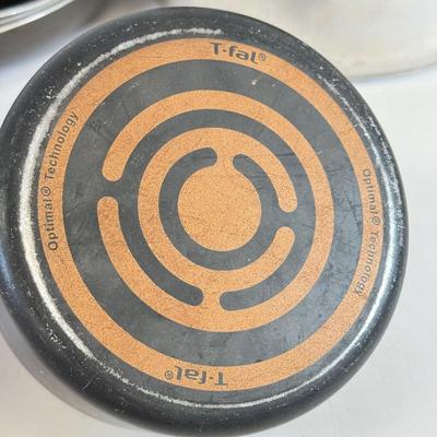 LOT 76: Hanging Metal Pot Rack w/ Farberware Pots & T-Fal Pans