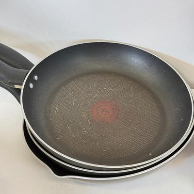 LOT 76: Hanging Metal Pot Rack w/ Farberware Pots & T-Fal Pans