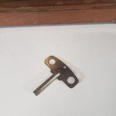 LOT 96: Vintage Howard Miller Mantel Clock with Key