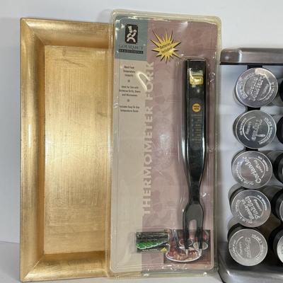 LOT 106: Olde Thompson Stainless Steel Spice Rack, Bacon & Burger Presses, Meat Thermometer Fork & More