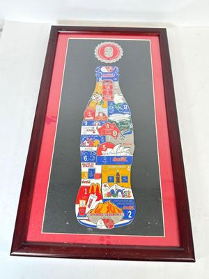 LOT 110: Framed Limited Edition Coca-Colay Sydney 2000 Olympics Bottle Puzzle Pin Set