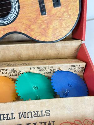 LOT 118: Vintage Flutophone, Mattel Strum-Fun Getar, LL Bean Log Cabin Building Set & More