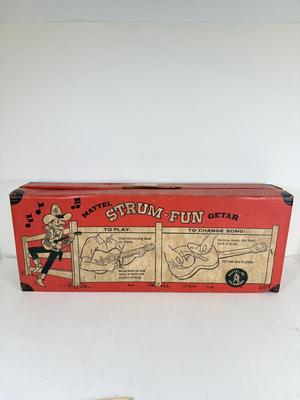 LOT 118: Vintage Flutophone, Mattel Strum-Fun Getar, LL Bean Log Cabin Building Set & More