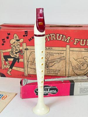 LOT 118: Vintage Flutophone, Mattel Strum-Fun Getar, LL Bean Log Cabin Building Set & More