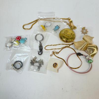 LOT 131: Camel Cigarette Pocket Watch w/ Rings, Pins & More