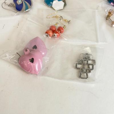 LOT 133: Eleven Pairs of Pierced Earrings